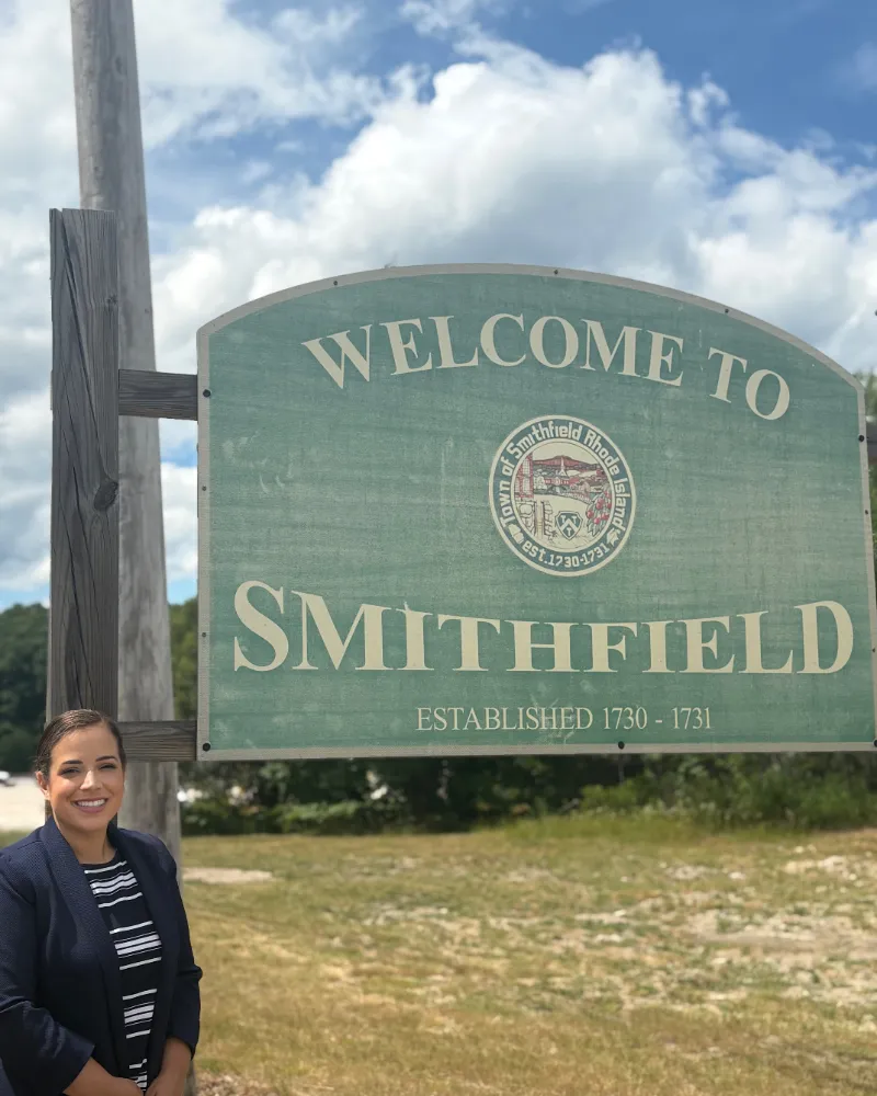 Suzy at the Smithfield sign
